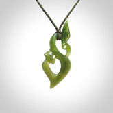 A beautiful hand carved New Zealand Jade Manaia pendant with adjustable olive cord.